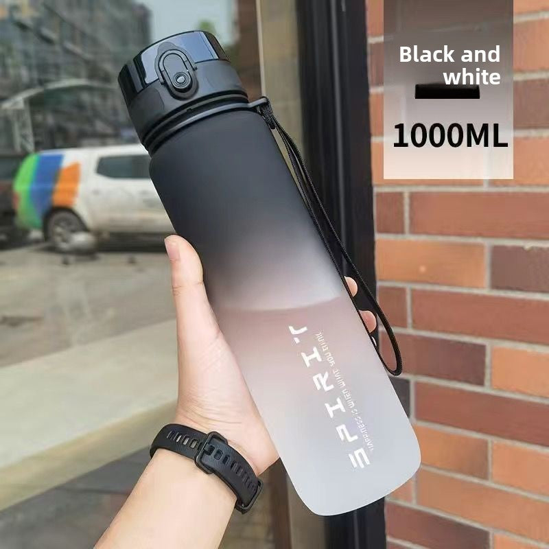 The sports water cup is made of plastic with a large capacity