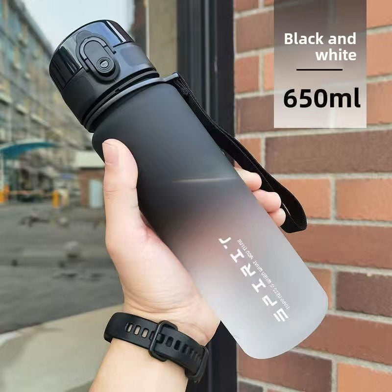 The sports water cup is made of plastic with a large capacity
